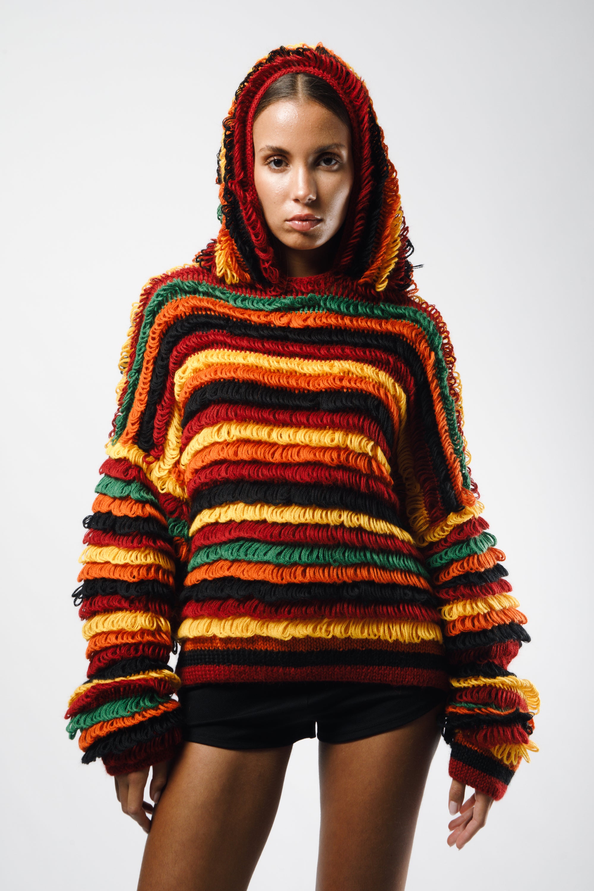 Reversible knitted wig hoodie, handcrafted with curly crochet in multicolor - front