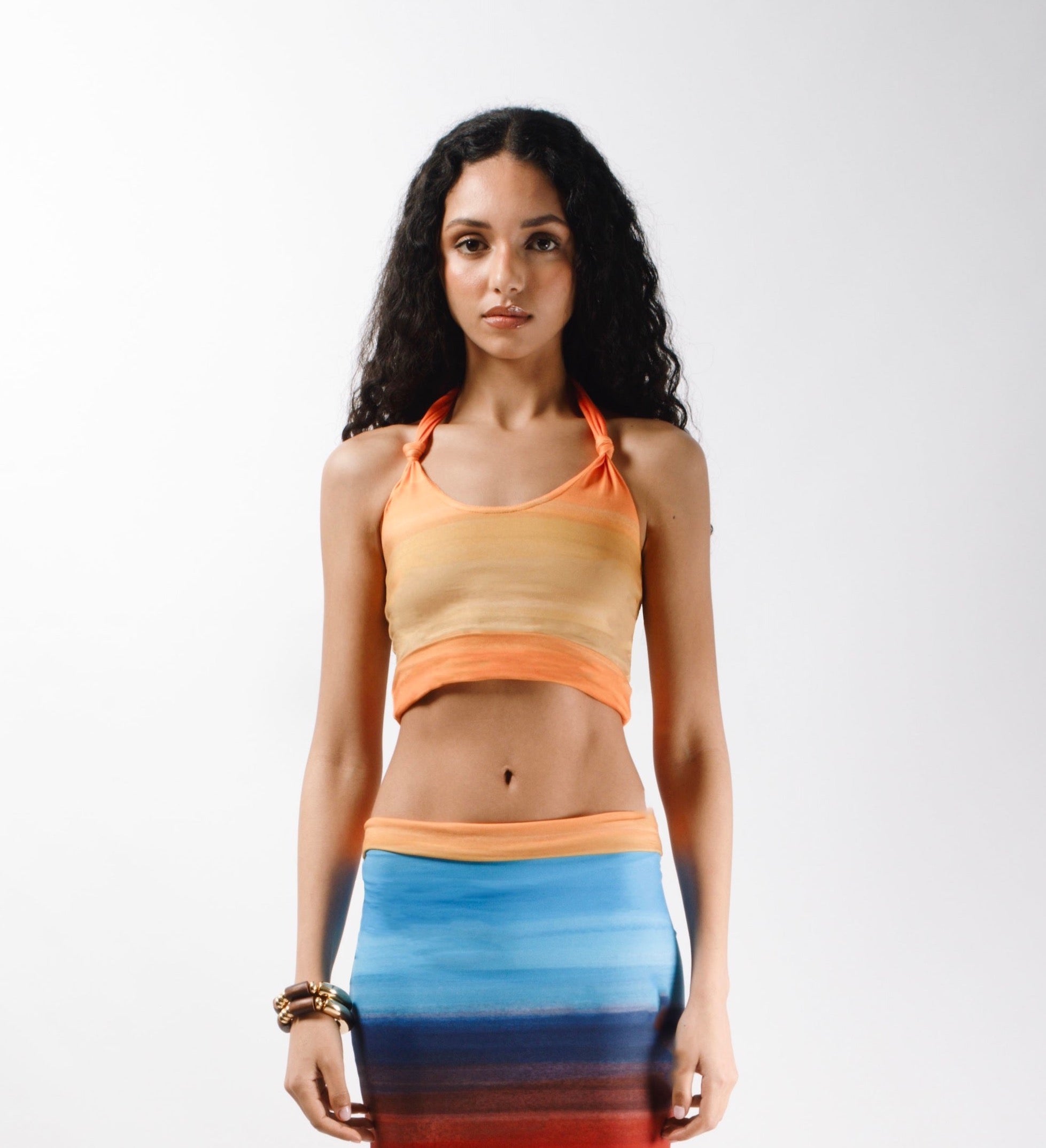 Crop top made from recycled printed Cotton featuring long self tie straps and a double returned hem - front