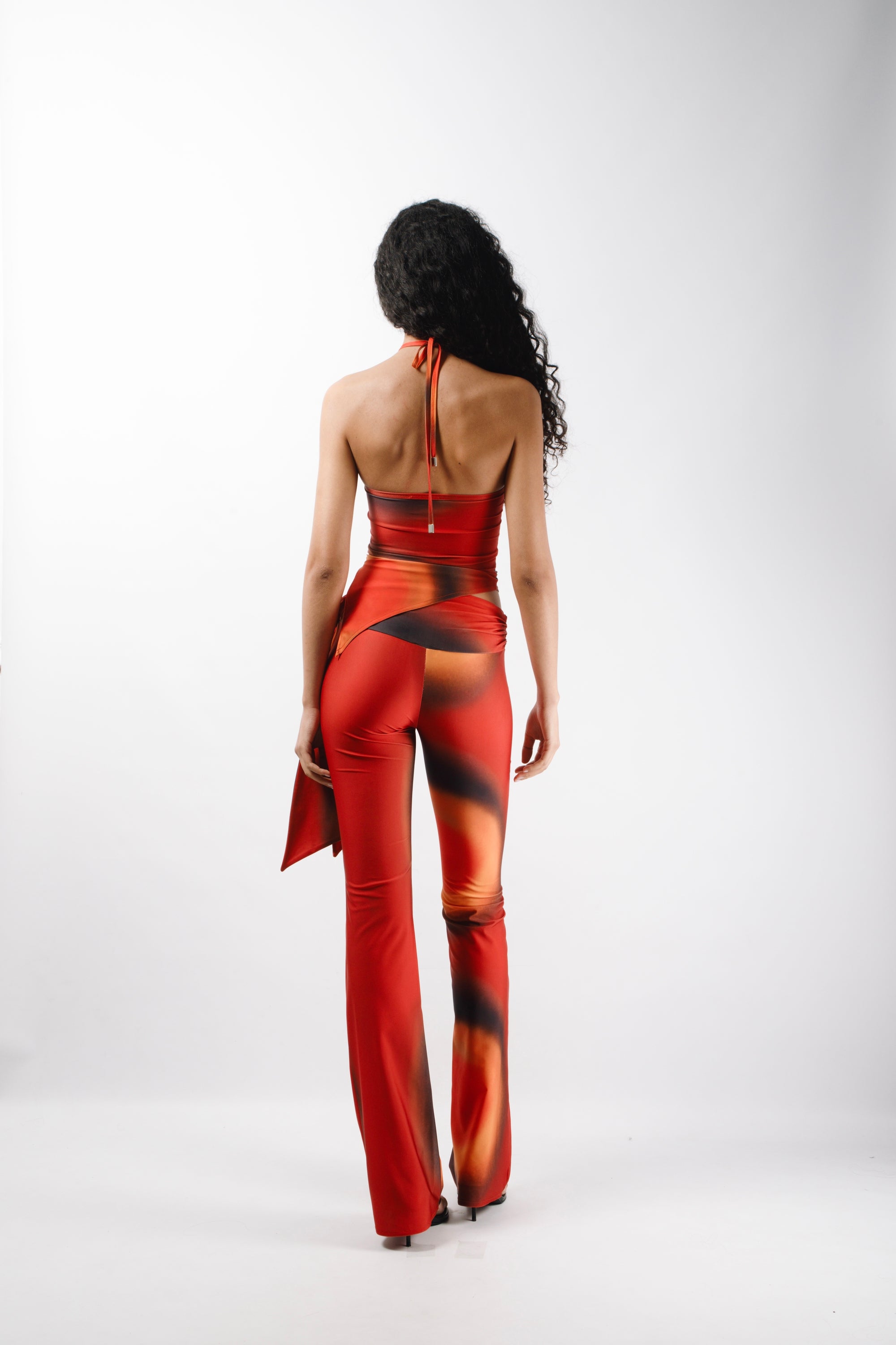 Long pants in printed jersey stretch made from recycled plastic bottles, with an adjustable pleated belt - back